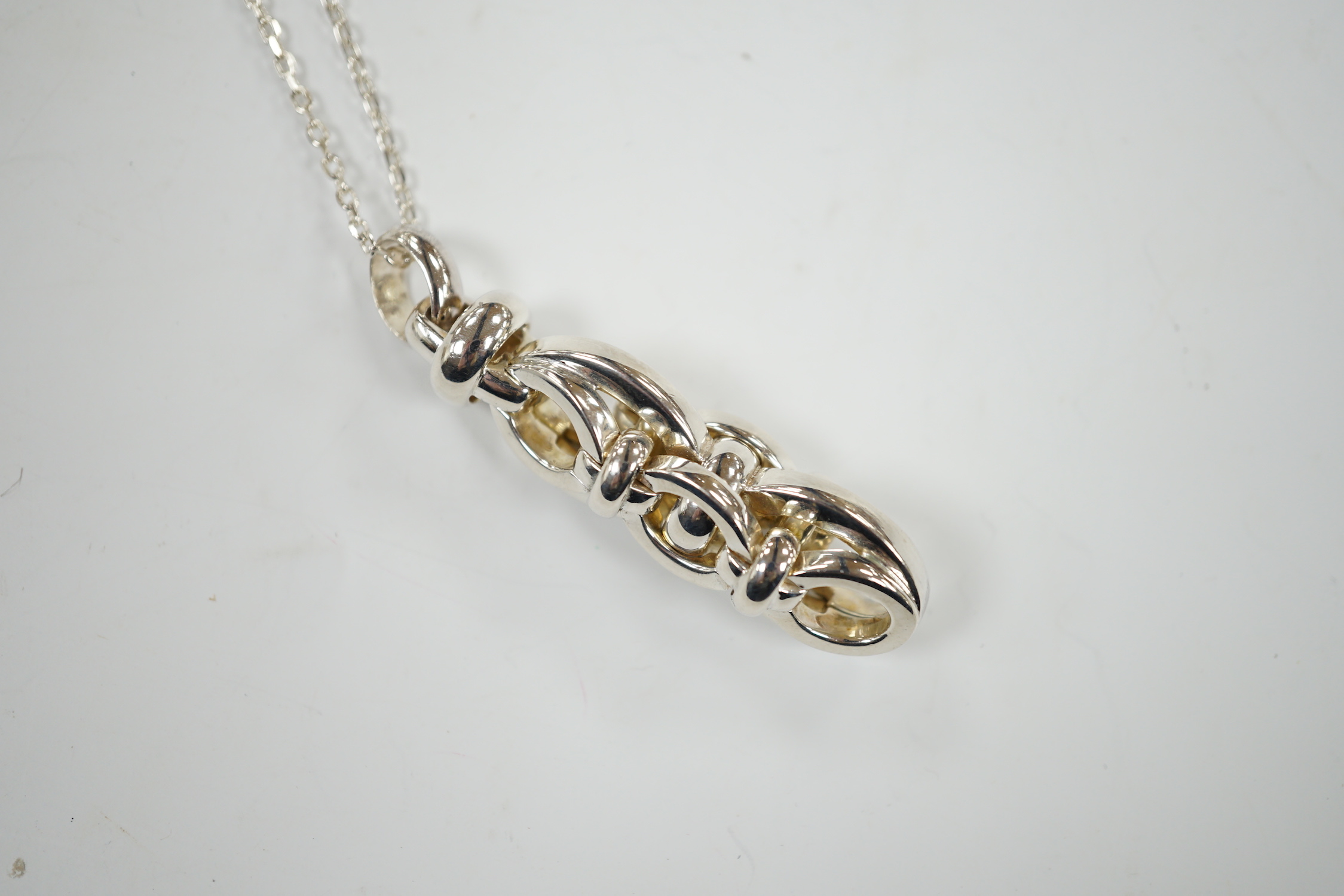 A modern Links of London silver oval link line pendant, 52mm, on a 925 fine link chain, 58cm, in Links of London box.